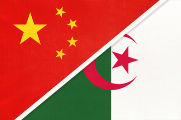 China or PRC vs Algeria national flag from textile. Relationship between Asian and African countries.