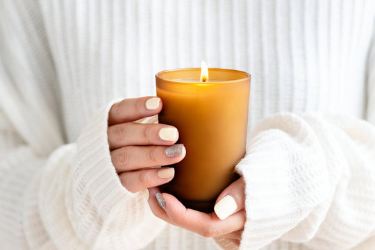 Woman Holding A Candle