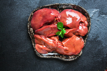  raw chicken liver
(healthy eating) keto or paleo diet menu concept background. top view. copy...