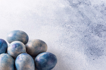 Colored eggs. big bright blue chicken eggs on a beautiful background