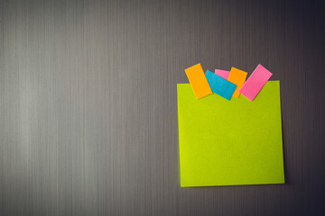 Empty paper sheet on refrigerator door with magnetic clip paper note for add text message.