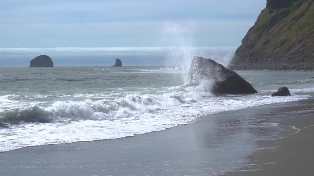 Ocean waves crashing against rocks on the Oregon Coast