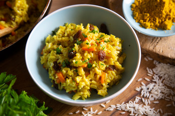 Yellow curry rice with vegetables and raisins