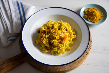Yellow curry rice with vegetables and raisins