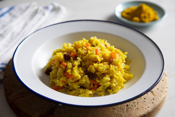Yellow curry rice with vegetables and raisins