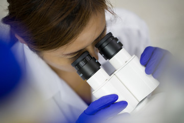 Picture of scientist using a microscope in a laboratory, Concept science and Technology,  Science background