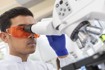 Picture of Scientist using a microscope in a laboratory, Concept science and Technology , Science...