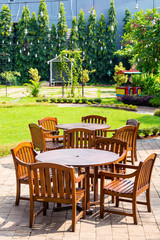 Wooden round table with chairs