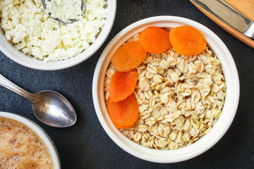 breakfast (oatmeal porridge, dairy products and more, snack) menu concept background. top view. copy space for text