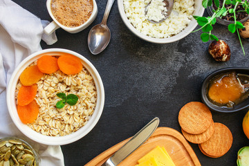 breakfast (oatmeal porridge, dairy products and more, snack) menu concept background. top view. copy space for text