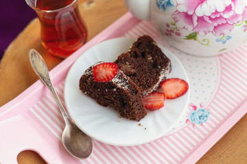 Teatime on a balcony with homemade cake