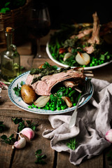 easter lamb with vegetables and herbs.style rustic.