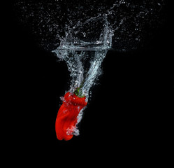 Pepper falling into the water
