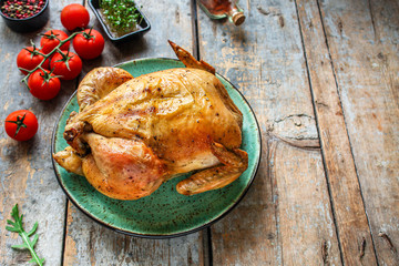 baked chicken, festive table (hen or turkey) menu concept background. top view. copy space for text keto or paleo diet
