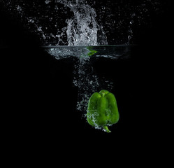 Pepper falling into the water