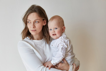 Mother and son in white clothes