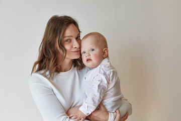 Mother and son in white clothes