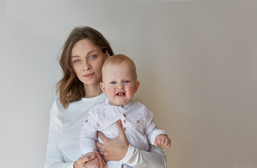 Mother and son in white clothes