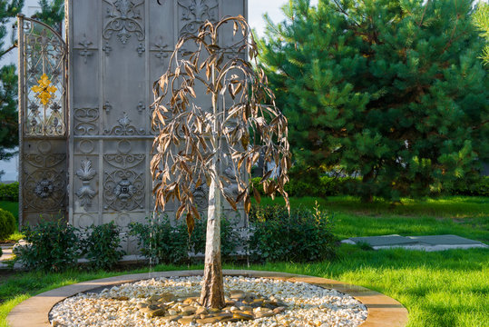 MUROM, RUSSIA - AUGUST 24, 2019: Weeping tree near the Metal "entrance" chapel of Seraphim of Sarov in  the Annunciation Monastery in Murom, Vladimir Region, Russia