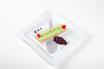 Dishes in white plates on a white background with the application of food design.