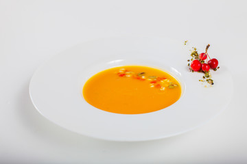 Dishes in white plates on a white background with the application of food design.