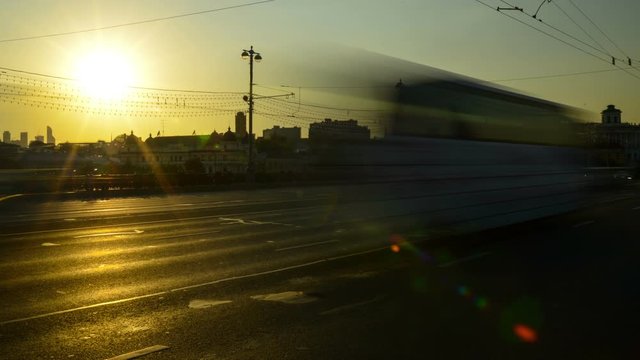Timelapse. Cars passing a bridge in Moscow before sunset