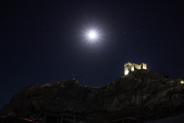 Ancient fortress at night under the moon in the city of Sudak, Crimea 23/04/18