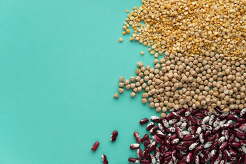 Different legumes - beans, chickpeas and peas. Vegetarian nutritional concept.