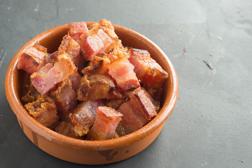 slice of bacon tapa typical spanish food