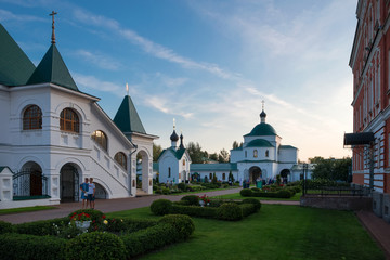 Fototapeta na wymiar MUROM, RUSSIA - AUGUST 24, 2019: On a summer evening on the territory of the Murom Spaso-Preobrazhensky Monastery. City Murom, Russia