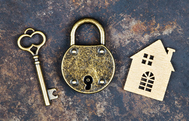 Home insurance, security, protection concept, key, house and padlock