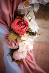 outdoor wedding arch of flowers