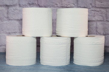 A close up of toilet rolls