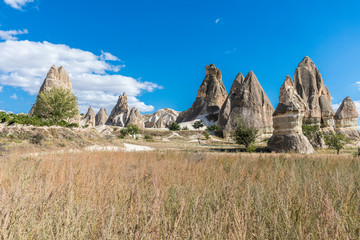 mountain landscape with blue sky, Cappadocia, Turkey.