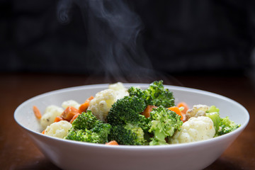 Dish with boiled vegetables.