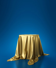 Golden luxurious fabric or cloth placed on top pedestal or blank podium shelf on blue background...