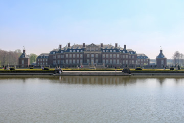Fototapeta na wymiar Nordkirchen Palace, The Versailles of Westphalia, with palace gardens and reflections in the lake, Nordkirchen, Germany