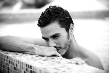 Man relaxing in a pool