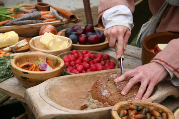 People prepare an authentic meal at the reenactment of The Battle of Hastings in the UK