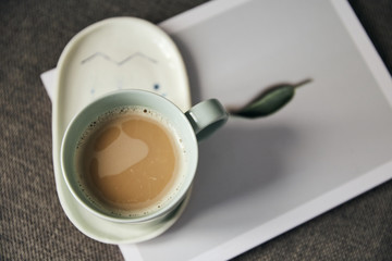 top view of white cup with fresh latte coffee 