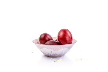 Christmas painted eggs and cake ,still life with different plates