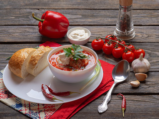 first course homemade hot Russian borscht with meat sour cream