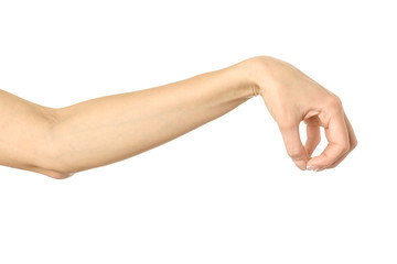 Hand picking, holding, grabbing or reaching. Woman hand gesturing isolated on white