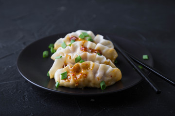 Seafood Dumplings with Sesame and Sauce