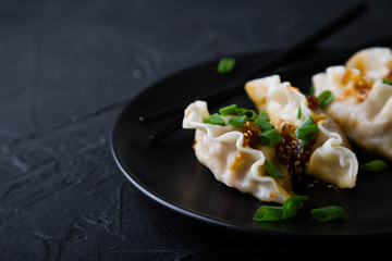 Seafood Dumplings with Sesame and Sauce