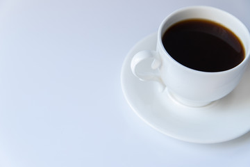 Cup of coffee on white background