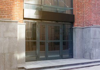Blank black rectangular box store entrance mockup, glass brick wall