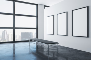 Modern exhibition hall interior with three empty billboards