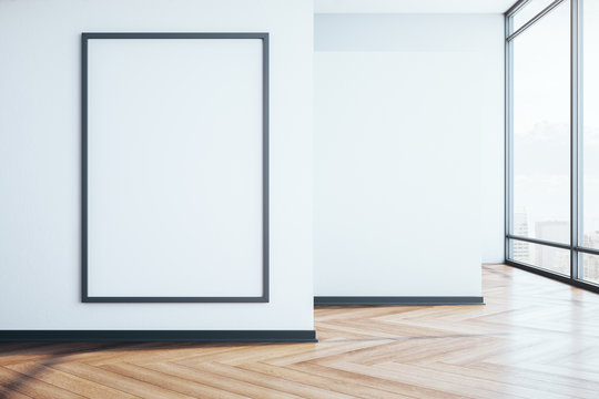 Minimalistic gallery room with city view and empty banner
