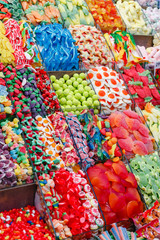 colorful fruit candies on a market stall in Barcelona